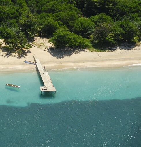 dock on the island of guanaja, honduras